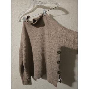 High neck beige sweater with button accents